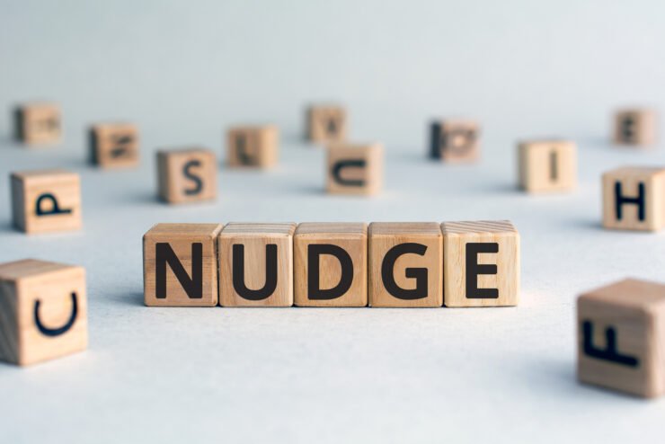 Nudge-word-from-wooden-blocks-with-letters