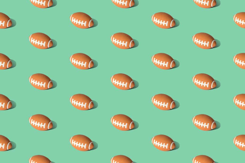 American-football-ball-pattern-on-green-background