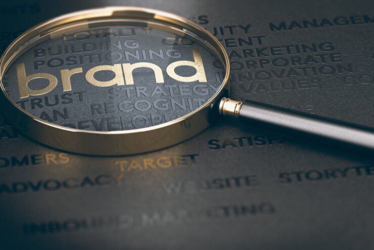 magnifying-glass-highlighting-the-word-brand