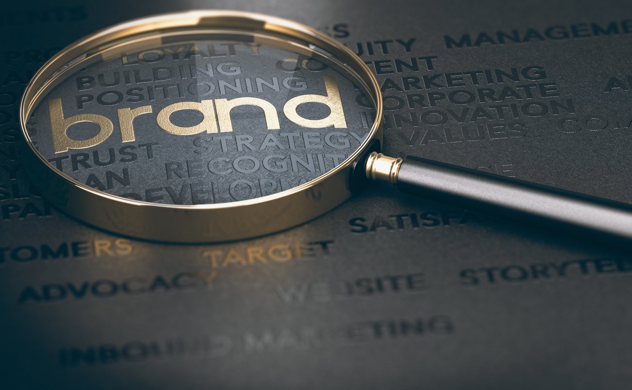 magnifying-glass-highlighting-the-word-brand