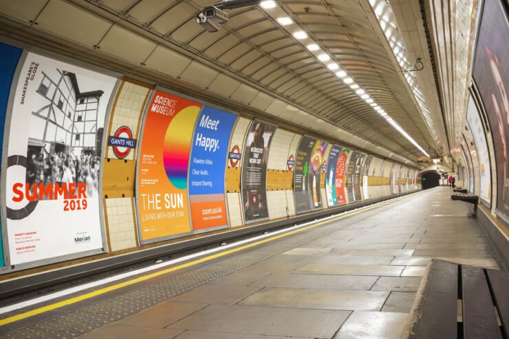 Empty platform at Gants Hill London Underground station advertising posters marketing campaigns